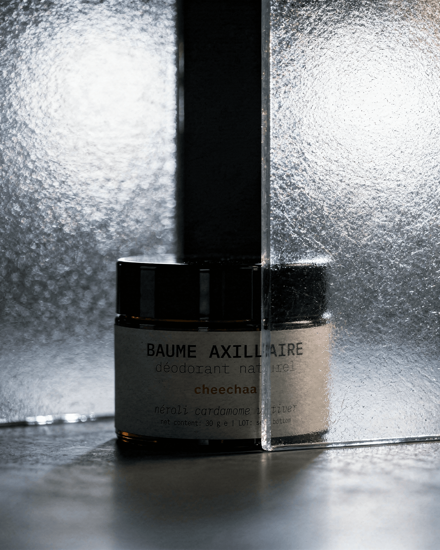 cheechaa BAUME AXILLAIRE néroli cardamome vétiver balm with cardamom and vetiver on stone